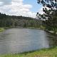A view of the Au Sable River and Highbanks Overlook from the Gabions Day Use area