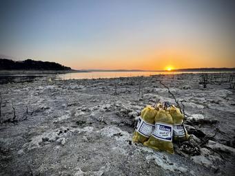 Shoreline sunset at Canyon Lake showing on-property lakefront scenery — useful scenic shot tied to the resort's lake access (gallery on site).