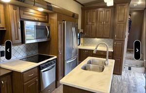 Spacious, stocked, delivered. King w/ pullout sofa