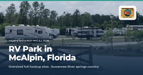 Header/social image showing multiple RVs and park frontage with trees and fencing; used as the McAlpin page social preview and provides a broader property view.