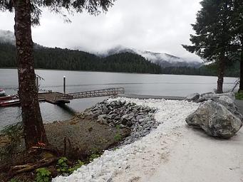 floating dock with ramp and view of ocean