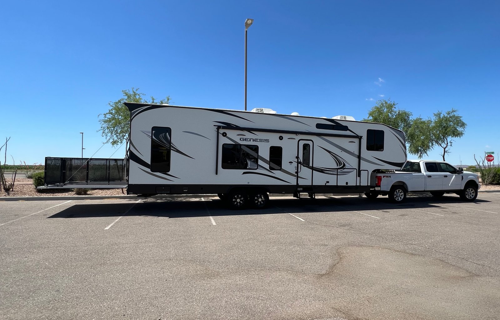 2020 Genesis 5th Wheel Toyhauler with deck patio