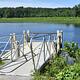 The Elm Brook Park fishing dock overlooking Hopkinton Lake on a sunny day.