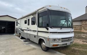 2001 Winnebago Adventurer 35Z RV rental photo 6