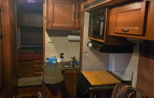2011 Coachmen RV Freelander 27QB RV rental photo 7