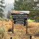 This photo depicts the Service Creek Boat Launch and Walk-in Camping site ID sign.