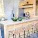 Close view of the dome kitchen/bar area with seating — highlights interior amenities and finishes available in the domes.