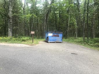A photo of facility ROUND LAKE with No Amenities Shown 
Dumpster 