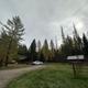 Owl Creek cabin in fall. With a rental corral next to it.