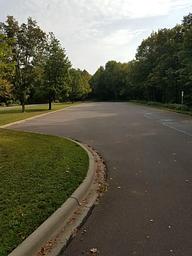 View of the parking area for the Clark Lake pavilion and day use area.