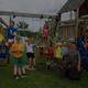 Playground scene with children and a play structure — demonstrates onsite family amenities and activity areas. Comes from the site's on-site amenities/gallery images.