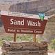 Bureau of Land Management brown portal sign for Sand Wash Portal to Desolation Canyon