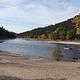 A view of the Clearwater River in the fall from the beach at Pink House Recreation Site.