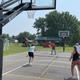 Pickleball and shuffleboard courts at Riverside Camping & RV Resort