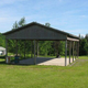 Open-sided pavilion/covered activity area on lawn with RVs and utility buildings in background — useful facility image showing common area (homepage image).