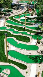 Aerial/overhead view of the mini-golf course on manicured grounds — shows a distinct on-site recreational feature referenced by the site (Mini-Golf context).
