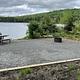 pond with picnic table in foreground