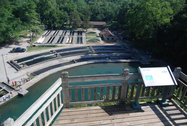 a wooden deck looking over a river