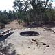 Seating around a Fire Pit surrounded by Cibola Forest