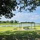 A photo of facility LAKESIDE (OK) with Picnic Table, Shade, Waterfront, Water Hookup