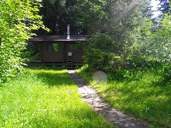 Path through grass leads to Shakes Slough 1 Cabin 