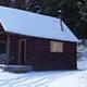View of Indian Flats Cabin during the winter with snow on the ground