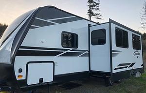 Fun AND Games in a comfy towable land yacht!