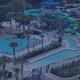 Wide landscape image of the waterpark area (slides, pools, deck space) providing a clear on-site amenity shot referenced on the Waterpark amenities page.