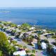 Aerial overview showing the resort layout with waterfront, docks and RV sites — useful for overall orientation. Source: homepage social image on the property site.