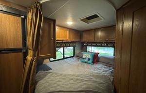 Adventure-Ready Coachmen 220QB w inflatable Kayaks