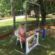 On‑grounds activity image showing a dunk‑tank/water game and picnic area — useful to illustrate family events and campground activities (appears in site event/gallery images).