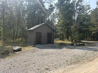 A photo of vault toilets Mack Lake ORV Campground