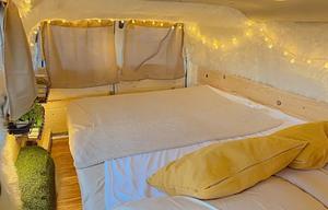 The Timber Den — Cozy Cabin Camper with Solar