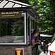 A Park Host greeting a visitor in their vehicle at the Elm Brook Park Entrance Booth.
