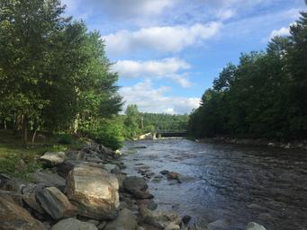 High-resolution riverbank view showing the waterway that runs through/adjacent to the property — useful scenic feature and on-site river access (source: Facilities page gallery).