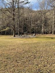 Kuykendall eating area includes picnic tables, fire ring, and bear boxes