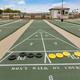 Shuffleboard courts with markers and numbered lanes — documents recreational courts available at the campground; sourced from the property gallery.