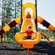 Playground slide with RV park visible in background — shows on-site family recreation facilities and proximity to the camping area as seen on the gallery.