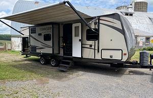 2014 Tracer 2750RBS 30’ travel trailer.