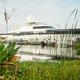 Marina dock/yacht view with waterfront and docks visible; clearly shows on-site marina facilities and waterside setting (from site gallery/contact page). Useful for resort marina context.