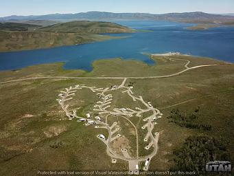 Drone view of a developed campground by a lake