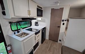 All aboard the Beaut! Big fun in a small camper!