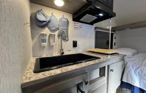Solar-powered, lightweight, adventure bunkhouse