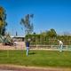 Putting/greens area with people playing and RVs visible behind — provides an overview of additional outdoor amenities and site proximity; matches resort photos on the listing page.