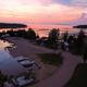 Aerial/drone view showing campground layout, RV sites, docks and lakefront — good overall overview of the property's grounds (matches homepage gallery image titled DJI_0015).