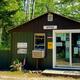 Small on-site building labelled “Office”/store with surrounding trees — useful to show check-in/amenities; sourced from the site’s Amenities page context.