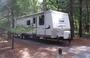 33-foot Chateau Travel Trailer w/real Queen bed. Home away from home delivered to you! Clean & safe!