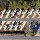 High, nadir aerial showing entire RV pad layout — useful overview of site arrangement and spacing (image from the gallery page showing drone/top-down view of Cozy Corner RV Lodge).