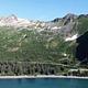 Glacier-carved peaks at Kenai Fjords National Park with the bay in the foreground