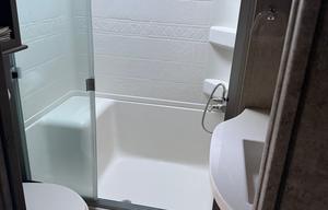 Spacious, stocked, delivered. King w/ pullout sofa